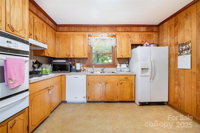 19924 Floral Ln, Cornelius, NC 28031 - kitchen with white appliances, a warming drawer, under cabinet range hood, light countertops, and light flooring