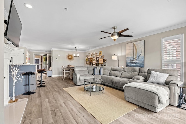 860 Jetton St Unit 59, Davidson, NC 28036 - living room featuring light wood-style floors, ceiling fan, ornamental molding, and recessed lighting