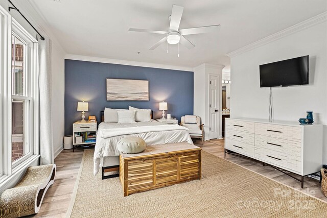 860 Jetton St Unit 59, Davidson, NC 28036 - bedroom featuring crown molding, wood finished floors, and a ceiling fan