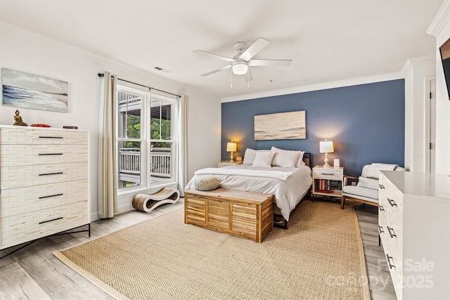860 Jetton St Unit 59, Davidson, NC 28036 - bedroom featuring ornamental molding, light wood-style floors, and a ceiling fan