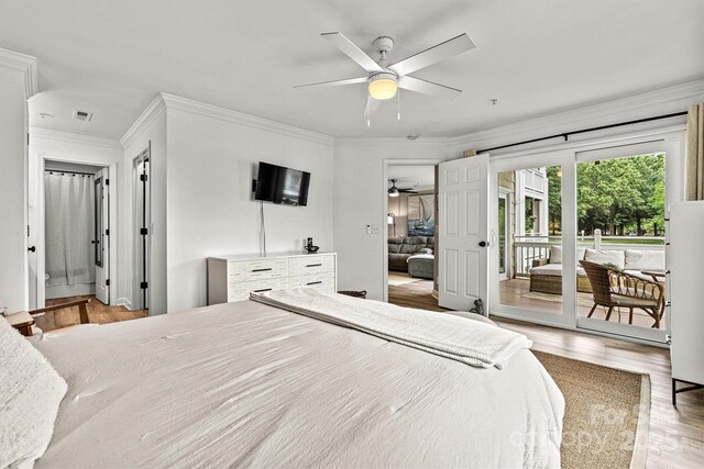 860 Jetton St Unit 59, Davidson, NC 28036 - bedroom featuring access to exterior, crown molding, wood finished floors, and a ceiling fan