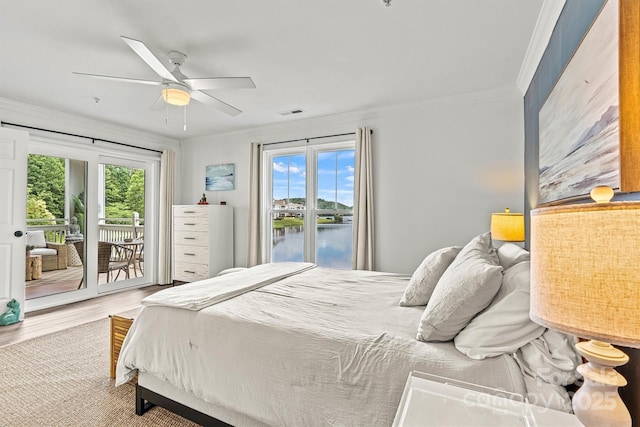 860 Jetton St Unit 59, Davidson, NC 28036 - bedroom with access to outside, crown molding, wood finished floors, a water view, and ceiling fan