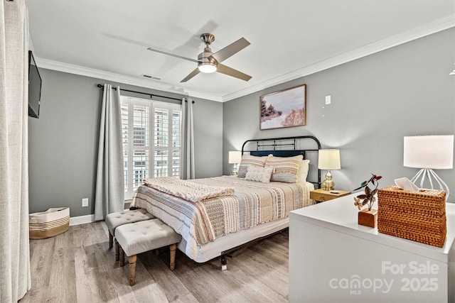 860 Jetton St Unit 59, Davidson, NC 28036 - bedroom with crown molding, wood finished floors, and a ceiling fan