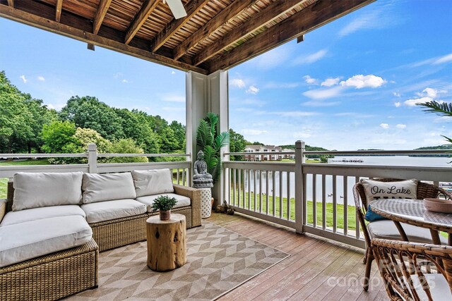 860 Jetton St Unit 59, Davidson, NC 28036 - wooden deck featuring outdoor lounge area and a water view