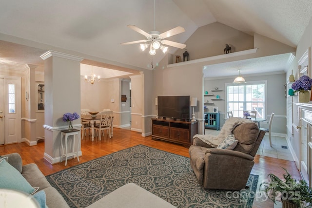 1 Loggerhead Dr, Columbia, SC 29229 - living area featuring lofted ceiling, a ceiling fan, wood finished floors, a chandelier, and ornamental molding