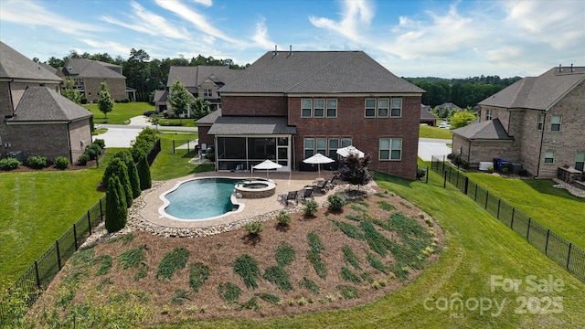 12410 Franklin Park Ln, Huntersville, NC 28078 - back of property featuring a fenced backyard, a patio area, a pool with connected hot tub, and brick siding