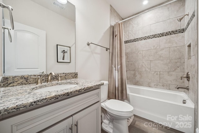 12410 Franklin Park Ln, Huntersville, NC 28078 - bathroom with shower / tub combo, vanity, and wood finished floors