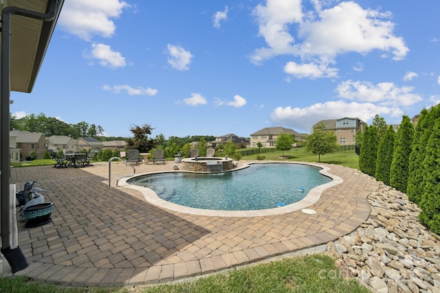 12410 Franklin Park Ln, Huntersville, NC 28078 - view of swimming pool with a patio, a pool with connected hot tub, and a residential view