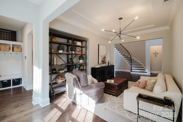 15103 Cimarron Hills Ln, Charlotte, NC 28278 - living room featuring stairs, a chandelier, wood finished floors, crown molding, and baseboards