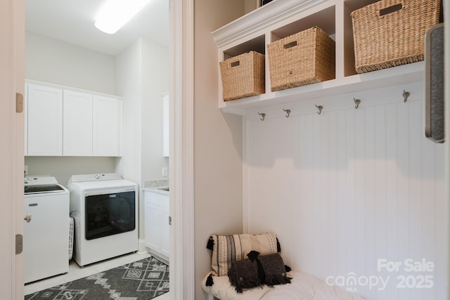 15103 Cimarron Hills Ln, Charlotte, NC 28278 - laundry area with cabinet space and independent washer and dryer