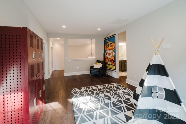 15103 Cimarron Hills Ln, Charlotte, NC 28278 - living room with wood finished floors, baseboards, and recessed lighting