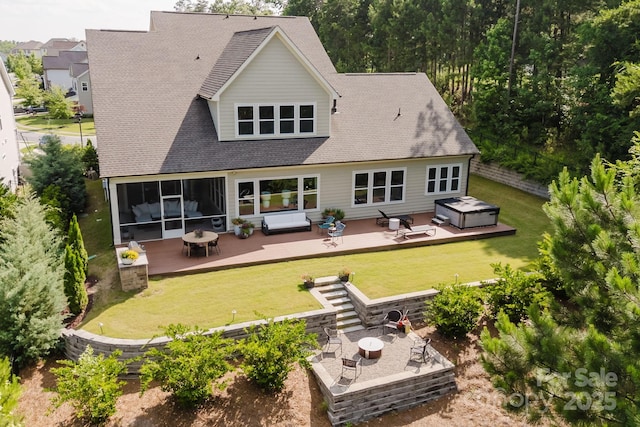 15103 Cimarron Hills Ln, Charlotte, NC 28278 - back of property with a wooden deck, a hot tub, a shingled roof, and a patio