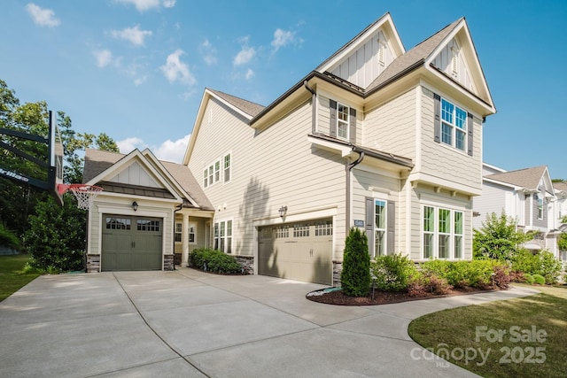15103 Cimarron Hills Ln, Charlotte, NC 28278 - view of side of home with board and batten siding, driveway, stone siding, and an attached garage
