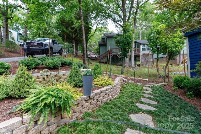 27092 Village Dr, Tega Cay, SC 29708 - view of yard featuring stairs and a deck