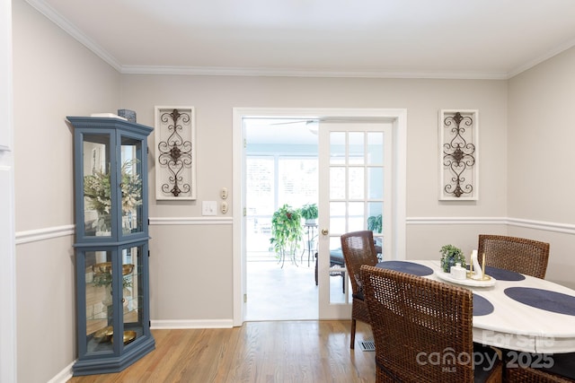 27092 Village Dr, Tega Cay, SC 29708 - dining area with wood finished floors and crown molding