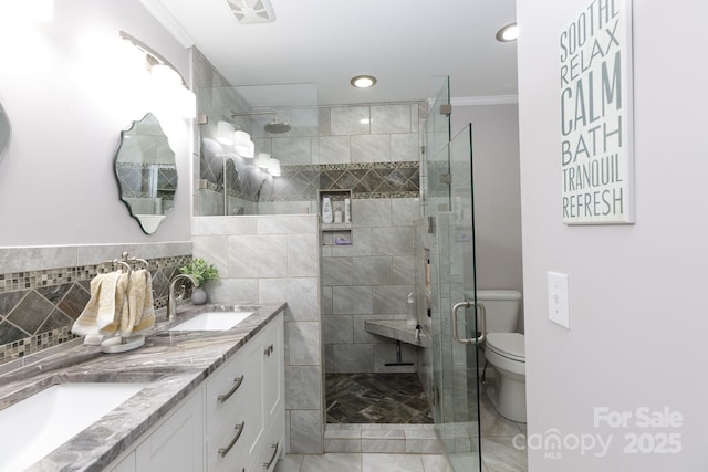 27092 Village Dr, Tega Cay, SC 29708 - full bath featuring double vanity, a stall shower, crown molding, and recessed lighting