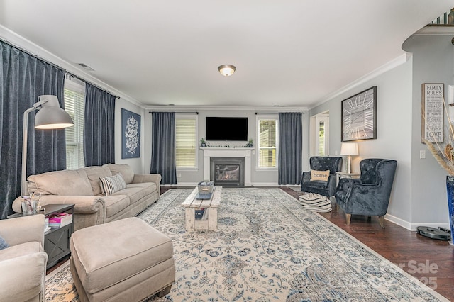 2606 Cheverny Pl, Concord, NC 28027 - living area featuring ornamental molding, wood finished floors, plenty of natural light, and a glass covered fireplace