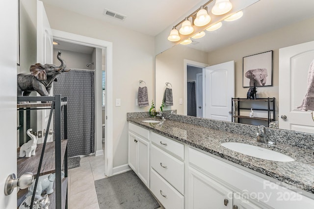2606 Cheverny Pl, Concord, NC 28027 - full bath featuring double vanity, tile patterned flooring, and a shower with curtain
