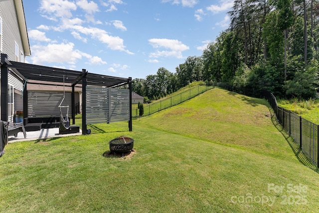 2606 Cheverny Pl, Concord, NC 28027 - fenced backyard featuring a fire pit, a pergola, and a patio area