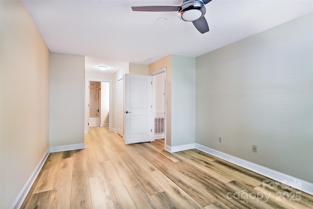234 Wash Creek Dr Unit B, Hendersonville, NC 28739 - unfurnished bedroom featuring light wood-style flooring and ceiling fan