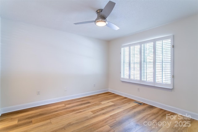 234 Wash Creek Dr Unit B, Hendersonville, NC 28739 - unfurnished room featuring a ceiling fan and light wood-style floors