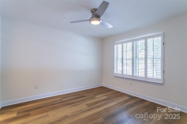 234 Wash Creek Dr Unit B, Hendersonville, NC 28739 - unfurnished room with a ceiling fan and wood finished floors