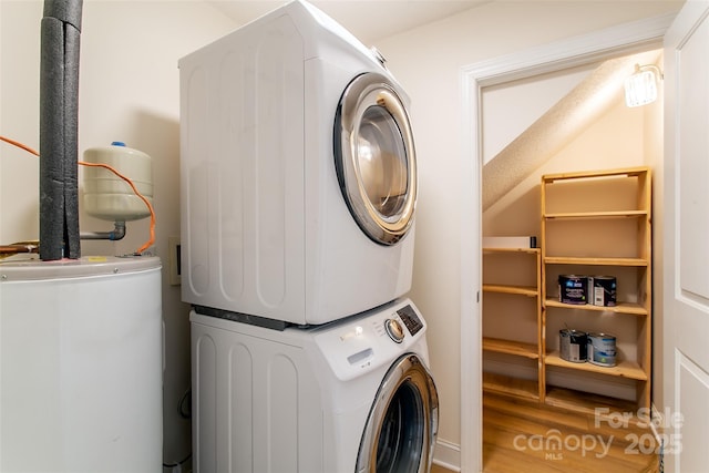 234 Wash Creek Dr Unit B, Hendersonville, NC 28739 - laundry room featuring stacked washer and clothes dryer, water heater, and wood finished floors