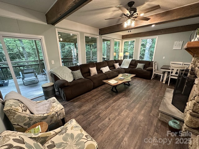 630 Shumont Rd, Black Mountain, NC 28711 - living room featuring beamed ceiling, wood finished floors, and a ceiling fan