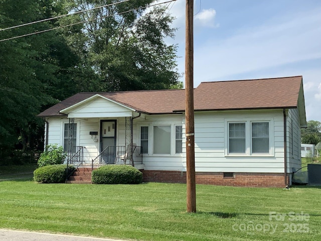1721 9th Ave NE, Hickory, NC 28601 - view of front of property with a front yard, a shingled roof, and crawl space