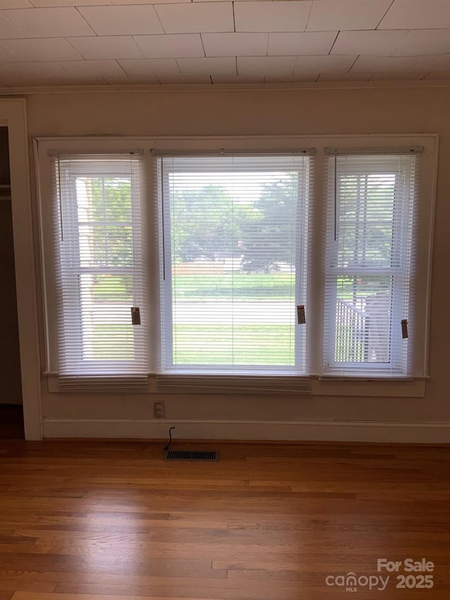 1721 9th Ave NE, Hickory, NC 28601 - empty room featuring light wood-style floors and ornamental molding