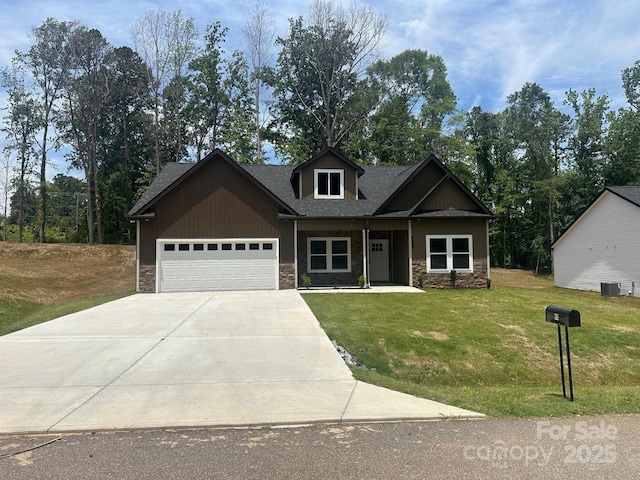 953 Mike Cir, Spartanburg, SC 29303 - craftsman-style house featuring stone siding, an attached garage, concrete driveway, and a front lawn