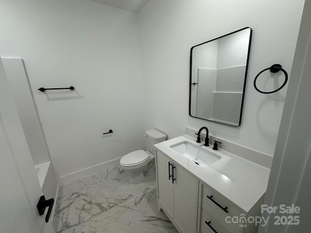 953 Mike Cir, Spartanburg, SC 29303 - bathroom with marble finish flooring, vanity, toilet, and baseboards