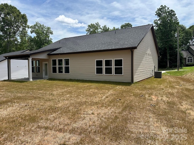 953 Mike Cir, Spartanburg, SC 29303 - back of property featuring a lawn, a shingled roof, and cooling unit