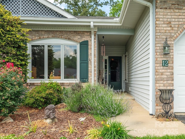 12 Country Meadows Ln, Hendersonville, NC 28792 - doorway to property with brick siding