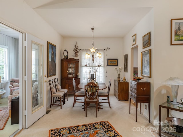 12 Country Meadows Ln, Hendersonville, NC 28792 - dining area featuring light carpet and a chandelier