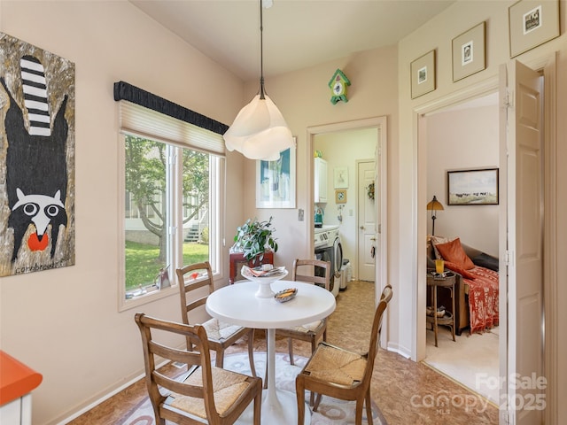12 Country Meadows Ln, Hendersonville, NC 28792 - dining space featuring baseboards and washer / dryer