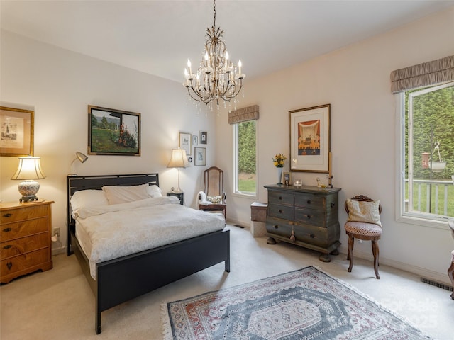 12 Country Meadows Ln, Hendersonville, NC 28792 - bedroom featuring light colored carpet and a chandelier