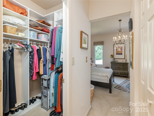 12 Country Meadows Ln, Hendersonville, NC 28792 - walk in closet with a chandelier and carpet flooring