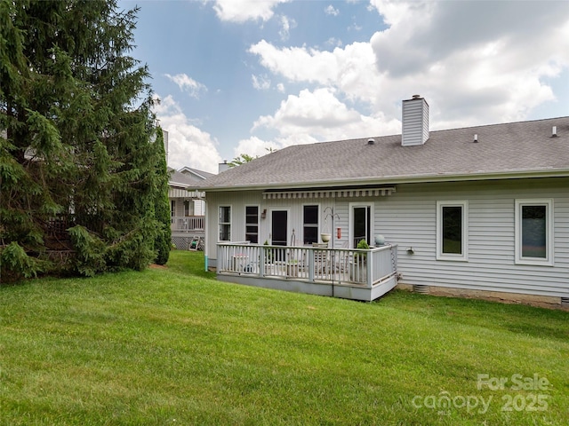 12 Country Meadows Ln, Hendersonville, NC 28792 - back of house with a chimney, a lawn, a deck, roof with shingles, and crawl space