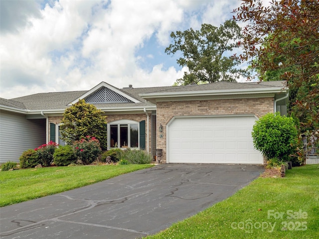 12 Country Meadows Ln, Hendersonville, NC 28792 - ranch-style home with driveway, a garage, a front yard, and brick siding