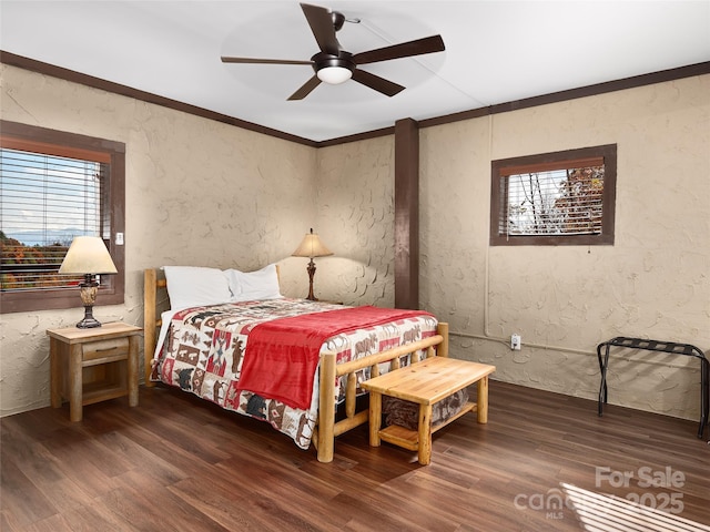 110 Garden Knoll Rd, Franklin, NC 28734 - bedroom featuring multiple windows, wood finished floors, a textured wall, ornamental molding, and a ceiling fan