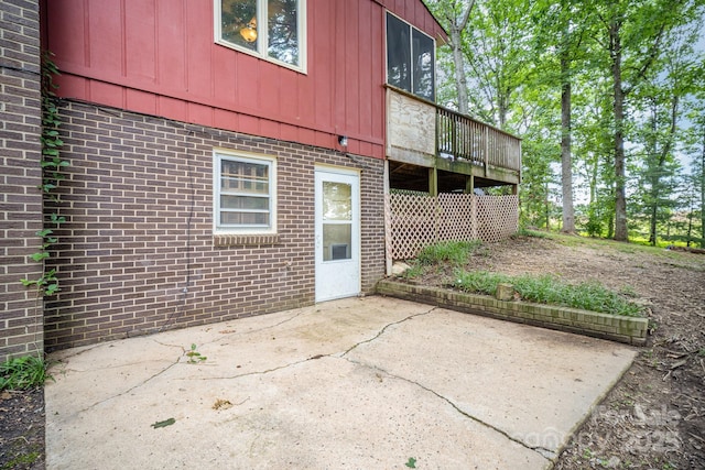 110 Hidden Valley St, Cherryville, NC 28021 - back of property featuring brick siding, a patio area, and a wooden deck
