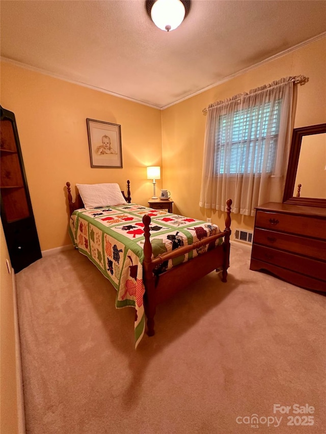 211 S Slack St, Albemarle, NC 28001 - bedroom with carpet flooring and ornamental molding