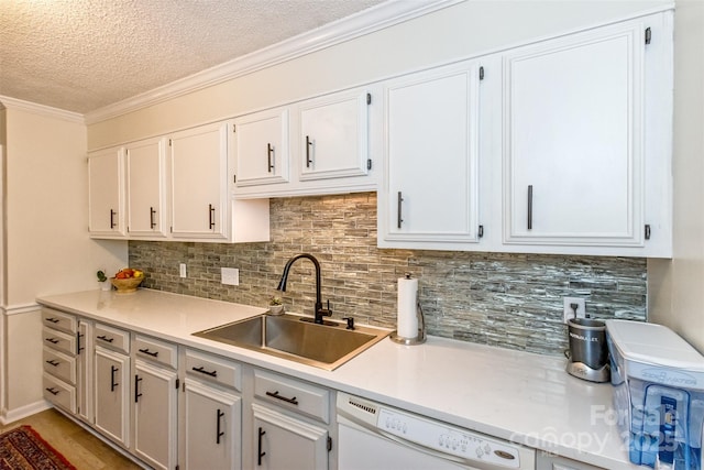 503 Crowfields Ln, Asheville, NC 28803 - kitchen with dishwasher, a textured ceiling, light countertops, tasteful backsplash, and ornamental molding