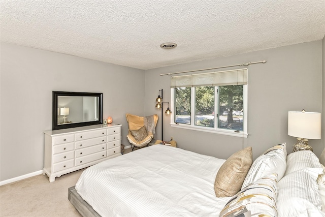 503 Crowfields Ln, Asheville, NC 28803 - bedroom featuring light carpet and a textured ceiling