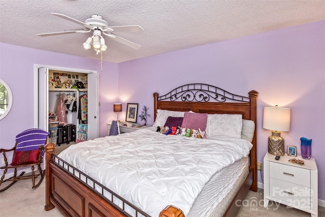 503 Crowfields Ln, Asheville, NC 28803 - bedroom with light carpet, a closet, a textured ceiling, and ceiling fan
