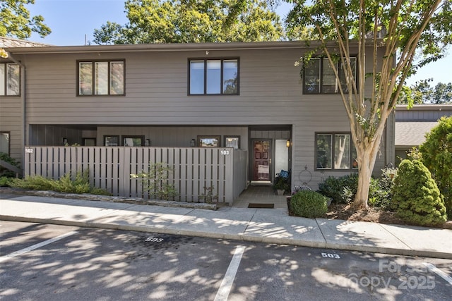 503 Crowfields Ln, Asheville, NC 28803 - townhome / multi-family property with a fenced front yard and uncovered parking