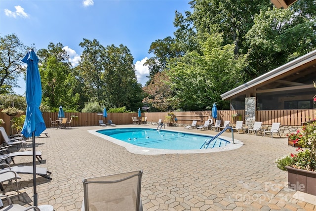 503 Crowfields Ln, Asheville, NC 28803 - community pool featuring a patio area and a fenced backyard