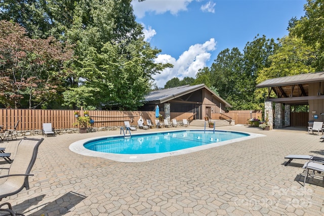 503 Crowfields Ln, Asheville, NC 28803 - community pool with a patio and an outbuilding
