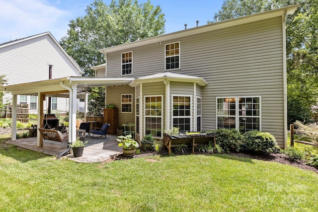 8700 Fox Tail Ln, Huntersville, NC 28078 - back of house featuring a patio area and a ceiling fan